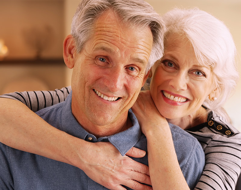 couple smiling on couch